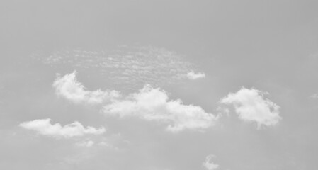 Gray sky with white clouds. Beautiful sky background and wallpaper. Concept Storm Clouds Raining.