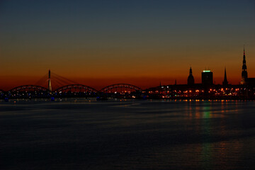 Night view city Riga on skyline background