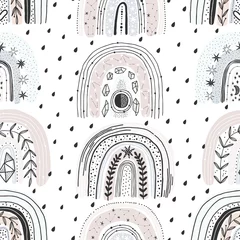 Tapeten Nettes nahtloses Muster mit Regenbogen und Regen. Kreativer Vektorhintergrund für Stoff, Textil, Kinderzimmertapete. Vintage-Hintergrund. © bukhavets