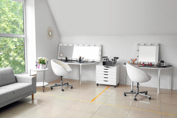 Fototapeta na wymiar Interior of beauty salon during coronavirus epidemic