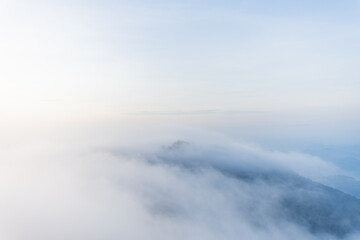 beautiful view on top mountain and mist at morning light. soft focus.