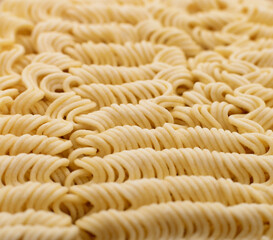 Texture of uncooked vermicelli.
