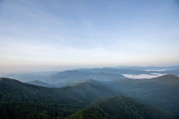 beautiful view on top mountain and mist at morning light. soft focus.