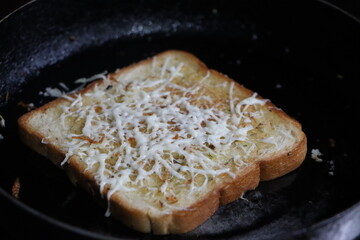 Garlic cheese bread toast, with herbs, morning breakfast  
