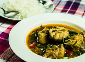 Fried cat fish with chili paste in plate, in door  Chiangmai Thailand
