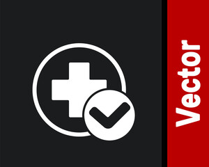 Obraz premium White Cross hospital medical icon isolated on black background. First aid. Diagnostics symbol. Medicine and pharmacy sign. Vector Illustration.