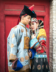 Fototapeta na wymiar young mongolian couple in traditional clothin