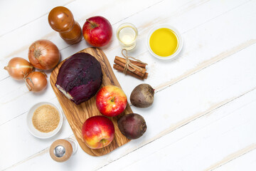 Red cabbage, onions, beets, apples, sugar, cinnamon sticks, salt, pepper, vinegar and olive oil