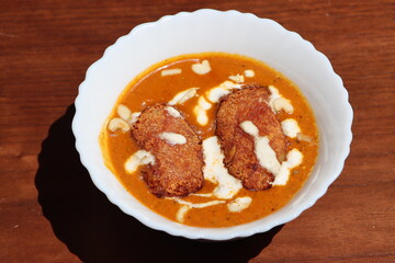 Malai kofta curry, made with cottage cheese, potatoes, cream, dry fruits, Indian food