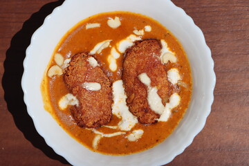 Malai kofta curry, made with cottage cheese, potatoes, cream, dry fruits, Indian food