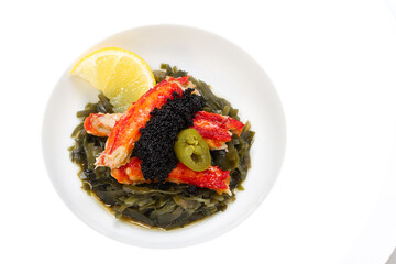 King crab, lemon, flying fish caviar, seaweeds, soy sauce and holopeno pepper