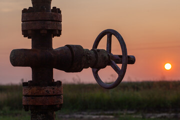 Oil pump valve at sunset