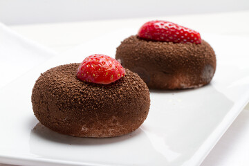 Homemade chocolate and strawberry cakes
