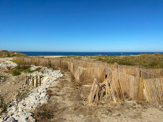 View of dune fencing to control wind erosion and encourage dune stability at the North Coast...