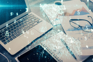 Double exposure of table with computer on background and data theme drawing. Concept of innovation.
