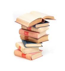 Stack of books with white sheets isolated on a white background