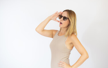 Beautiful blonde woman with sunglasses gesturing