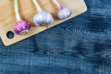 High Angle Still Life View of garlic on Wooden Cutting Board