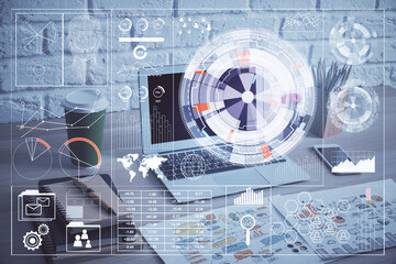 Double exposure of desktop computer and technology theme hologram. Concept of software development.