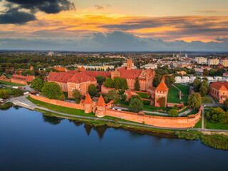 Malbork castle over the Nogat river at sunset, Poland