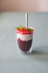 Tasty yogurts on a green table. Soft selectiv focus. Healthy desserts. Healthy concept of life