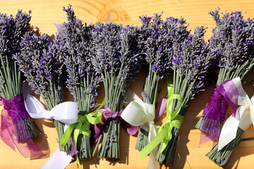 Lavender flower bouquet on a wooden table with copy space