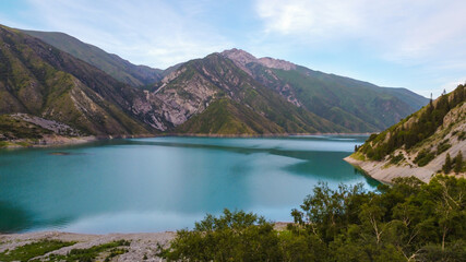 Obraz na płótnie Canvas Beautiful mountain turquoise color lake Karasuu in Tian-Shan, Kyrgyzstan.
