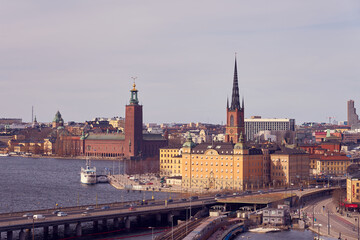 Gamla Stan island, an old city of Stockholm on a sunset with cloudy sky on the background.