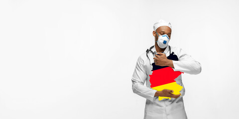 Beautiful african-american doctor cares about Germany over white studio background. Copyspace. Concept of healthcare and medicine, taking care, treatment, diagnostics during coronavirus outbreak.