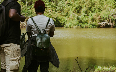 A young woman with backpack on a hike in Pugu hills in Kisarawe Tanzania