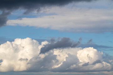 Dark grey storm clouds before rain. Dramatic natural sky background