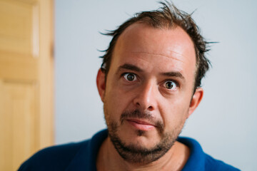 Fototapeta premium Crazy man looking at the camera