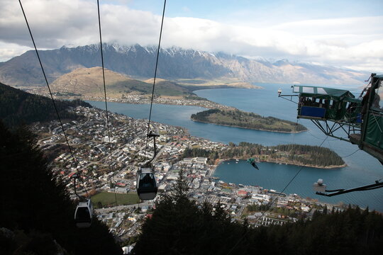 Aerial view of Cable Car above Queenstown and Lake Wakatipu with Bungee Jumping and the Remarkables mountain range in Queenstown  New Zealand