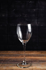 glass of wine on a black background