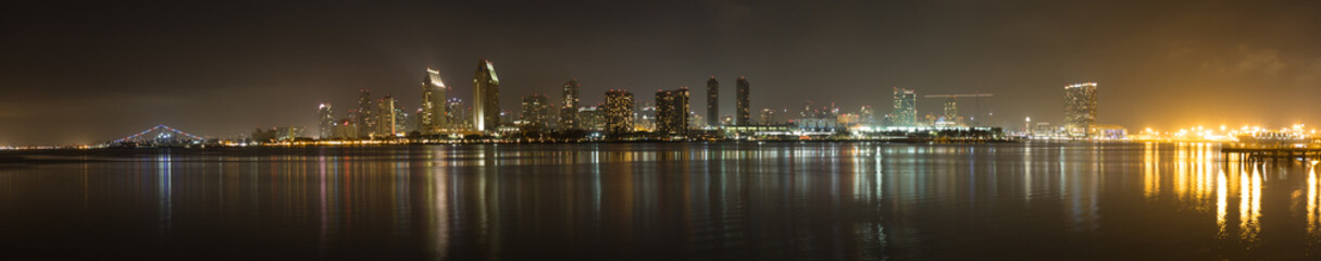 Panorama of San Diego Waterfront at night, as seen from Coronado Island, California, USA