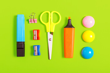 Different school supplies on a green background. Concept back to school. Study concept. Stationery store concept. flat lay, top view.