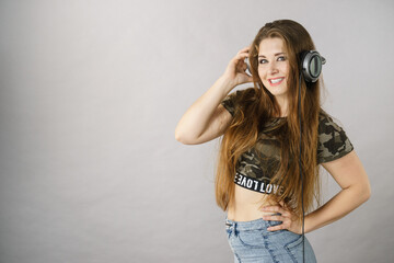 Teen women wearing headphones