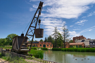 Antigua y abandonada antigua draga en la darsena del Canal de Castilla a su llegada a Valladolid,...