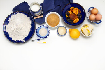 Traditional Russian Easter cake ingredients: flour, yeast, sugar, lemon, milk, eggs, butter, dried...