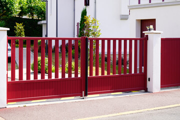 Aluminum dark red metal gate of suburb house steel door