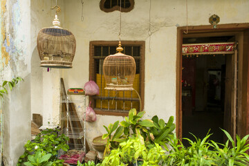 bamboo bird cage in an old house in Ipoh, Malaysia