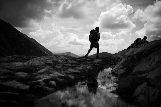 Hinking in the alps mountain with backpack and landscape