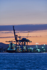 Fototapeta na wymiar cranes at the port