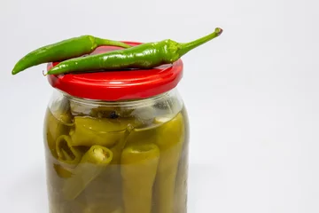 Gardinen Chilischoten Homemade marinated chili peppers on a white background  © sigitas1975
