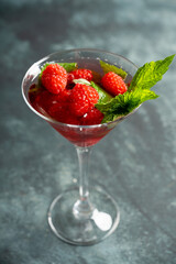 Raspberry martini cocktail. Selective focus. Shallow depth of field.
