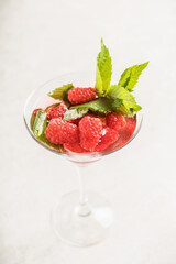 Raspberry martini cocktail. Selective focus. Shallow depth of field.
