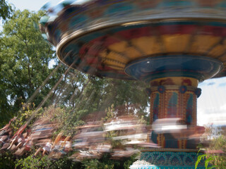 carousel in amusement park fair in motion