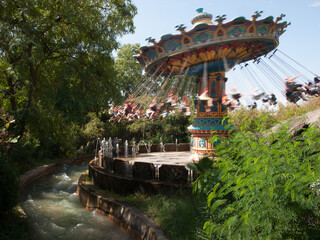 carousel in amusement park fair in motion