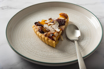 Homemade Peach tart with almond topping
