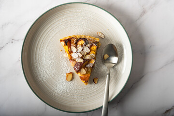 Homemade Peach tart with almond topping